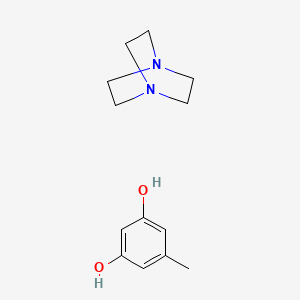 B12531283 1,4-Diazabicyclo[2.2.2]octane;5-methylbenzene-1,3-diol CAS No. 843663-45-6