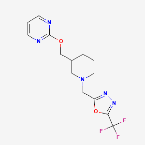 B2969191 2-[(1-{[5-(Trifluoromethyl)-1,3,4-oxadiazol-2-yl]methyl}piperidin-3-yl)methoxy]pyrimidine CAS No. 2379950-18-0